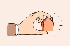 Teckning av en hand som håller ett litet hus mellan fingarna, mot rosa bakgrund